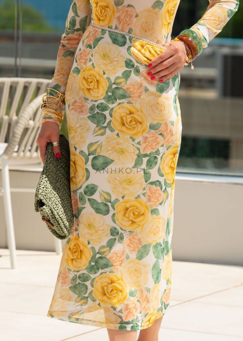 Spódnica midi w kwiatowy wzór z wysokim stanem, lekki, zwiewny fason w kobiecej, miejskiej stylizacji.