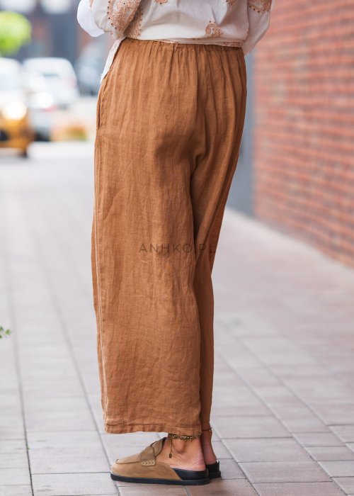 Spodnie damskie lniane w kolorze kamelowym, szerokie nogawki, długość do kostki, wysoki stan, styl boho casual