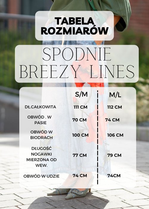 Jasne, szerokie spodnie damskie w pionowe paski, z lekkiego materiału, o luźnym, przewiewnym kroju idealnym na lato