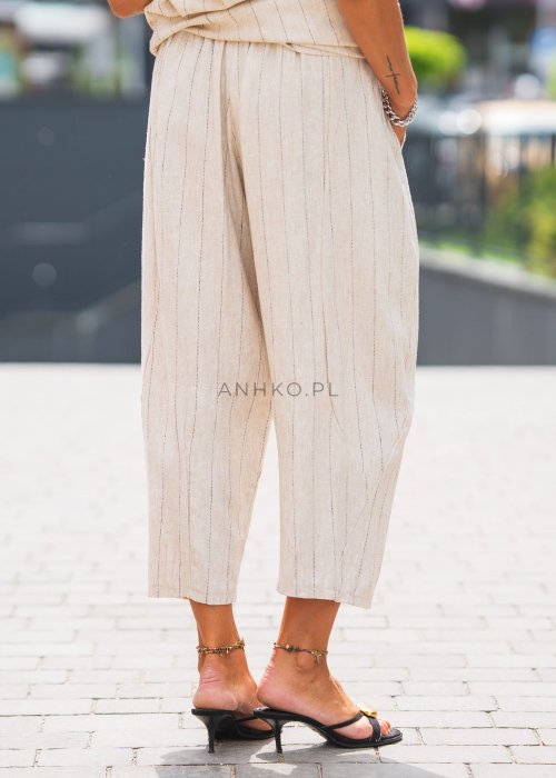 Lniane spodnie damskie w kolorze beżowym w cienkie paski, o luźnym kroju 7/8