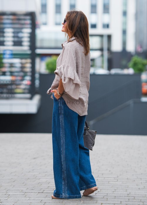 Lniana, beżowa koszula z szerokimi rękawami i wiązaniem z przodu.