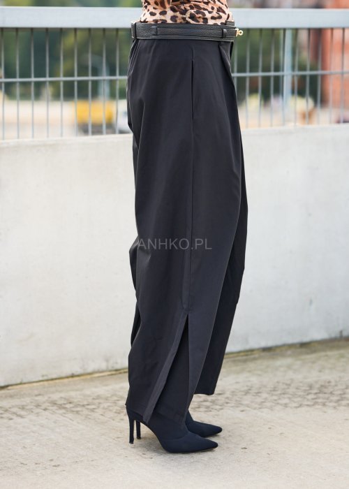 Czarne szerokie spodnie damskie z wysokim stanem i marszczeniem po bokach, styl oversize, moda streetwear