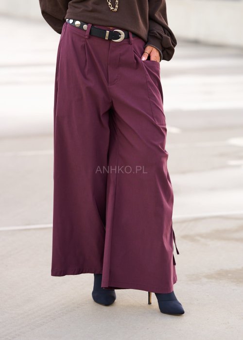 Bordowe spodnie damskie wide leg z rozcięciami i marszczeniem po bokach, wysoki stan, styl boho oversize