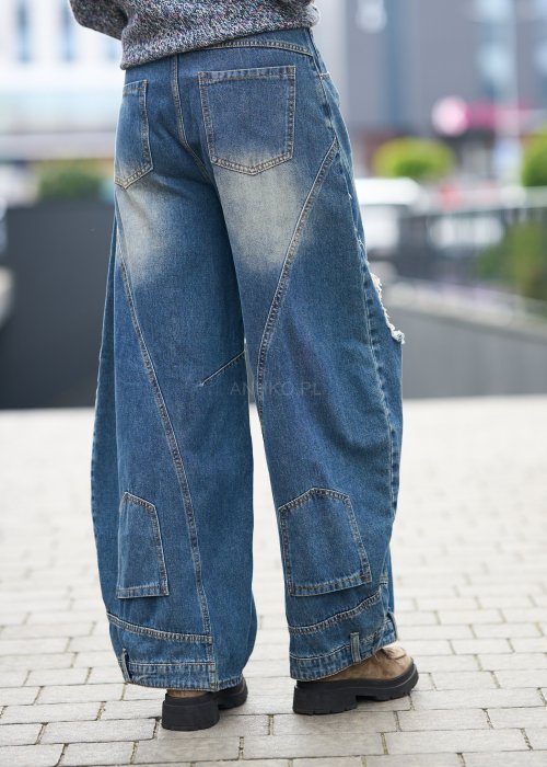 Szerokie jeansy typu baggy z przetarciami i dziurami, w odcieniu spranego niebieskiego
