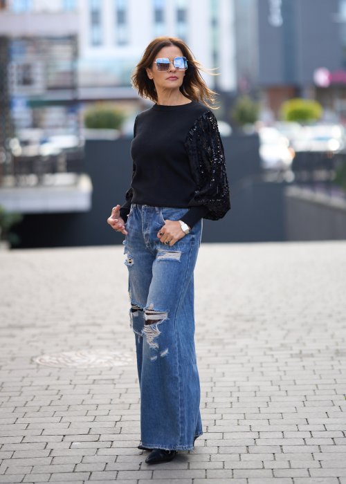 Szerokie jeansy z przetarciami i dziurami, denimowe spodnie w stylu oversize