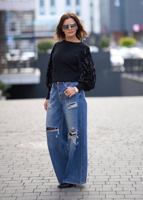 Szerokie jeansy z przetarciami i dziurami, denimowe spodnie w stylu oversize