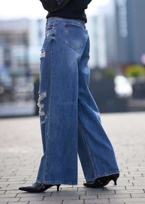 Szerokie jeansy z przetarciami i dziurami, denimowe spodnie w stylu oversize