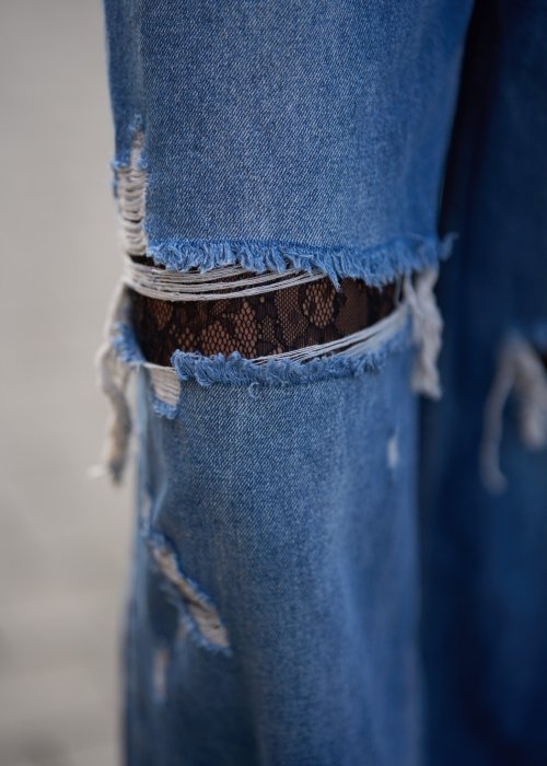 Szerokie jeansy damskie z przetarciami i dziurami, denimowe spodnie w stylu oversize