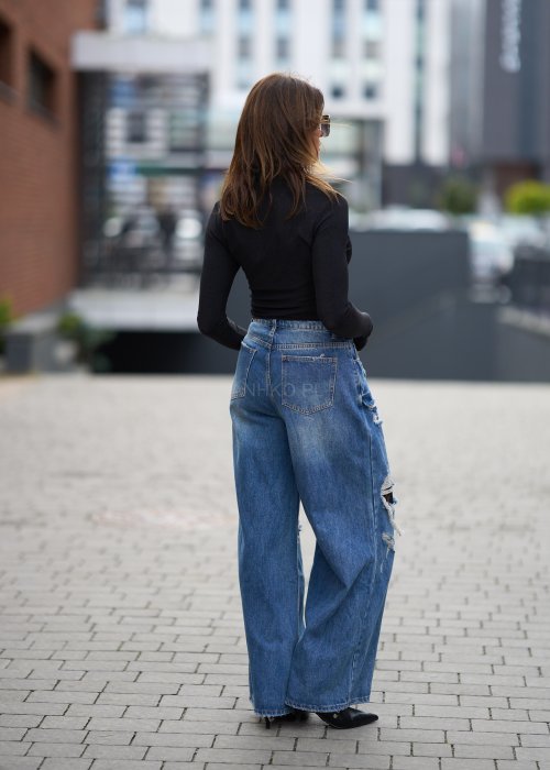 Szerokie jeansy z przetarciami i dziurami, denimowe spodnie w stylu oversize