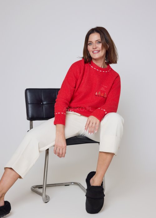 Materiałowe spodnie ecru o prostym kroju z szerokimi mankietami