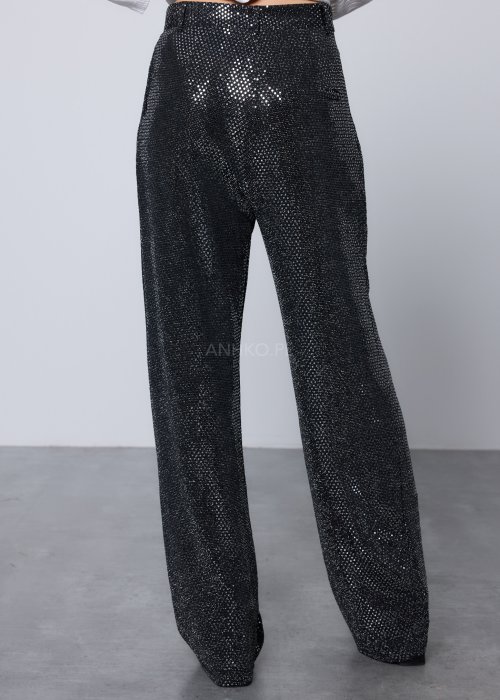 Czarne szerokie spodnie o połyskującej, cekinowej fakturze
