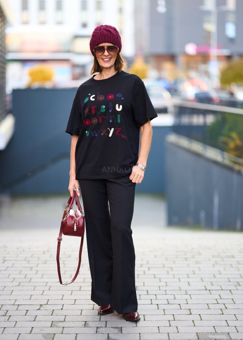 Czarne eleganckie spodnie z rozszerzanymi nogawkami