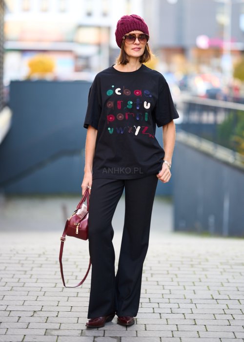 Czarne eleganckie spodnie z rozszerzanymi nogawkami