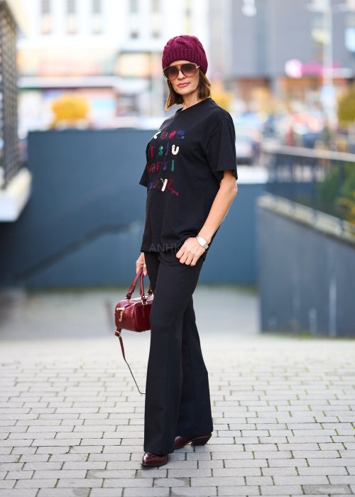 Czarne eleganckie spodnie z rozszerzanymi nogawkami