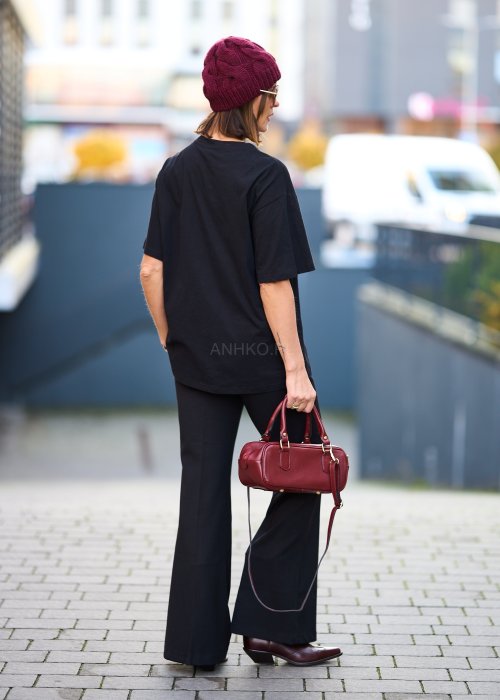 Czarne eleganckie spodnie z rozszerzanymi nogawkami