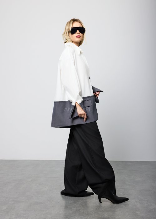 Czarne, eleganckie spodnie z wysokim stanem i szerokimi nogawkami, z zakładkami w pasie