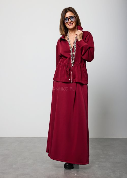 Bordowa spódnica damska o długości maxi, prosta i gładka, z delikatnym przeszyciem z przodu, widok od tyłu