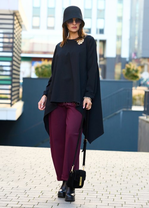 czarna tunika damska oversize o asymetrycznym kroju z długim rękawem, elegancka moda miejska