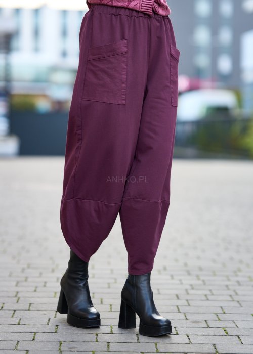 Śliwkowe spodnie damskie o luźnym kroju z obniżonym stanem i dużą kieszenią, styl oversize