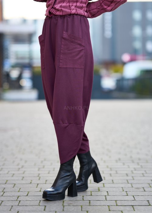 Śliwkowe spodnie damskie o luźnym kroju z obniżonym stanem i dużą kieszenią, styl oversize