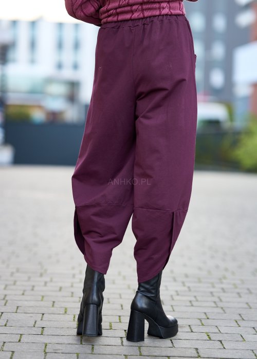 Śliwkowe spodnie damskie o luźnym kroju z obniżonym stanem i dużą kieszenią, styl oversize