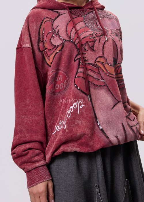 Bordowa bluza damska oversize z kapturem i dużą cekinową grafiką, swobodny fason w miejskiej stylizacji.