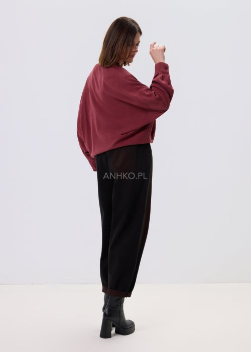 Czarne jeansy damskie Riven Fade z efektem washed i brązowym cieniowaniem, luźny krój relaxed, elastyczna guma w pasie, styl casual.