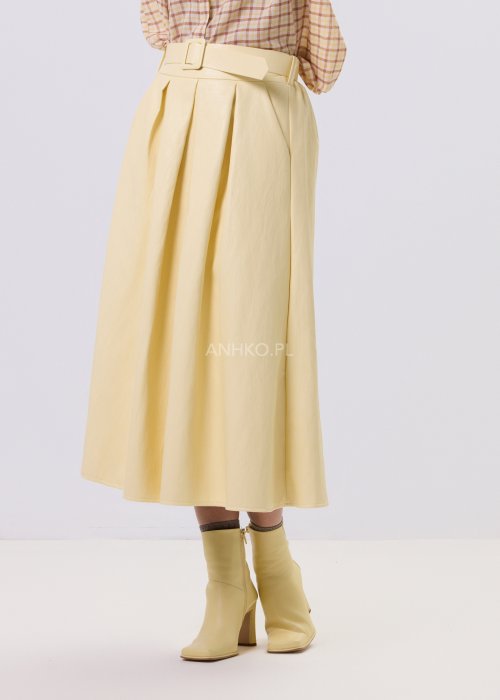 Masełkowa spódnica Castro midi z wysokim stanem, rozkloszowany fason, elastyczna talia i ozdobny pasek, styl casual elegancki.