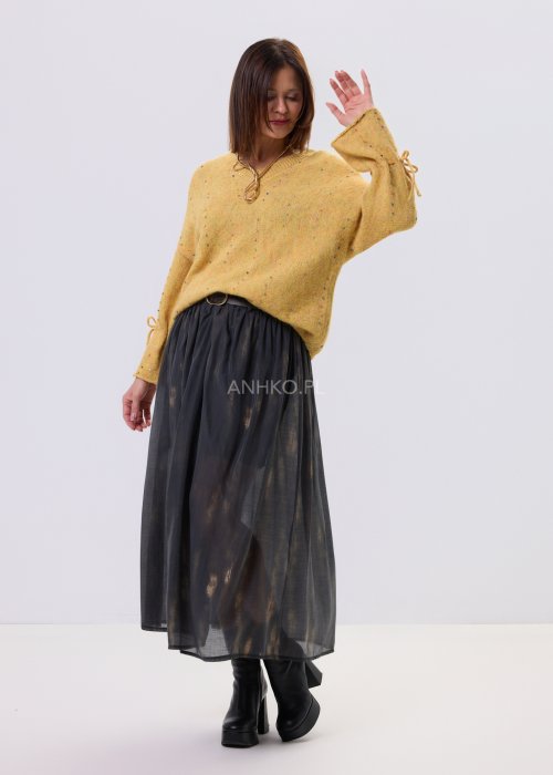 Żółty sweter damski Liora Waypoint z ozdobnym wiązaniem na rękawach, luźny fason, miękka elastyczna dzianina, styl casual.