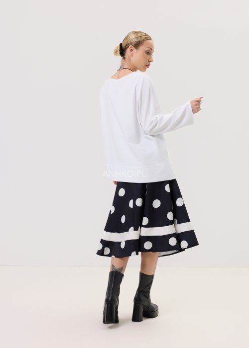 Damska spódnica Una Wener czarna – rozkloszowany fason midi, wysoki stan, print w duże grochy, kontrastowy pas przy dole, elegancka tkanina.