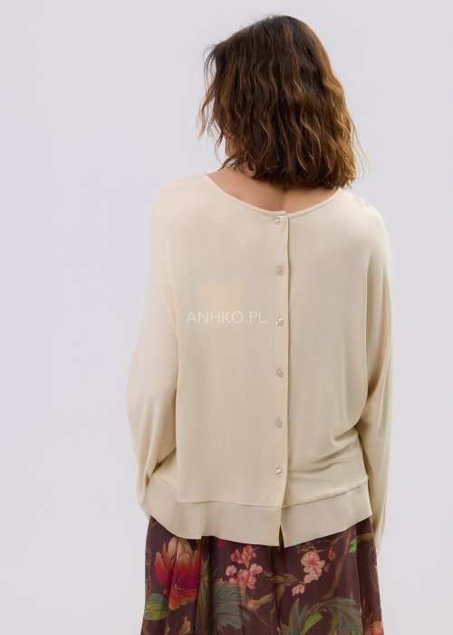 Beżowa bluzka oversize z miękkiego materiału z guziczkami z tyłu