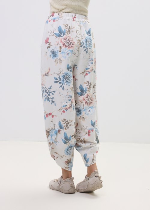 Spodnie damskie w kwiatowy print z szeroką nogawką i kieszeniami cargo – luźny fason z elastyczną talią i pastelowym wzorem
