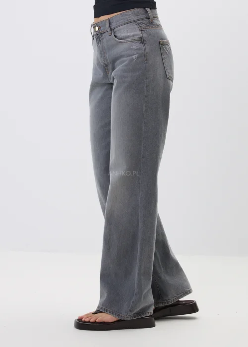 Szare jeansy damskie z szeroką nogawką, modne spodnie denim z wysokim stanem i delikatnymi przetarciami do codziennych stylizacji.
