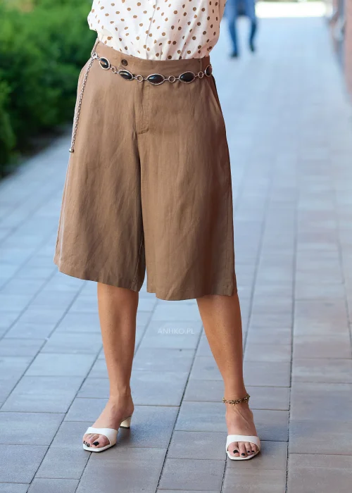 Pasek biżuteryjny na łańcuszku z ozdobnymi kamieniami w odcieniach brązu i srebrnymi detalami. Elegancki dodatek podkreślający talię i stylizacje boho oraz glamour.