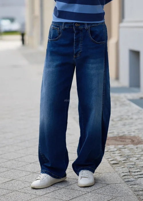 Denimowe jeansy damskie Varello w ciemnoniebieskim kolorze, szeroki fason wide leg z wysokim stanem i klasycznymi kieszeniami.